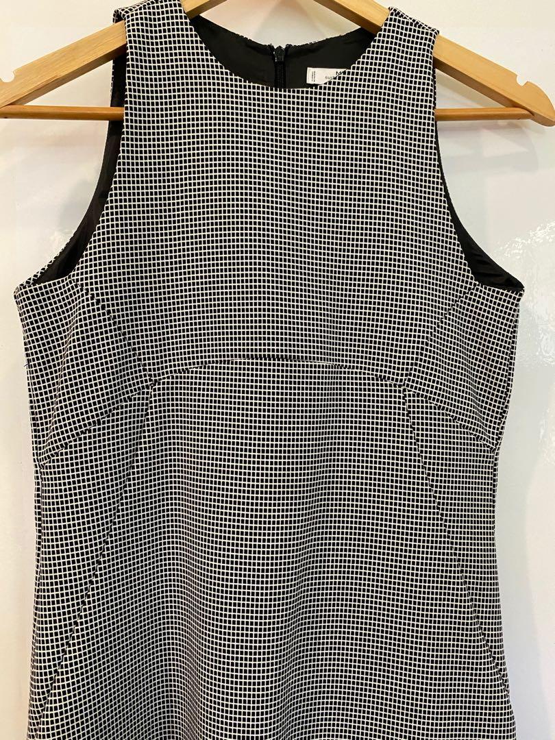 Mango Suit Sleeveless Checkered Dress (Category: Dresses) located in Quezon City. Submitted by relovable (Listing ID 1077848089, Image 3). Description: Brand: Mango Suit Condition: Good condition, but wore this more than 5x Style: Corporate/dressy, but top is slightly halter style, falls above the knee Size: Small Color: Checkered black and white 🌟 SPECIAL OFFER IF BUYING MULTIPLE ITEMS 🌟 ▪️ +10% off if buying 2-3 items ▪️ 25% off if buying 4+ 