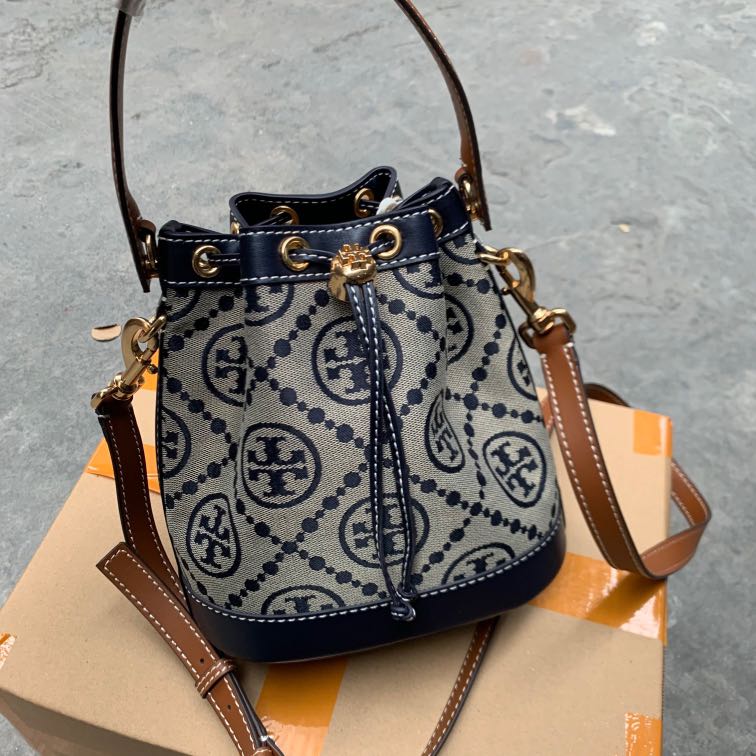 Tory burch monogram bucket bag store