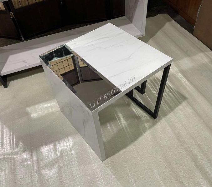 Side Table (Category: Other Home Furniture) located in Quezon City. Submitted by tjfurnitureph (Listing ID 1078049598, Image 2). Description: Model: Jurere side table Dimension: L 18" x W 18" x H 18" inches Material: Steel mdf board Marble top finished kulay Brand new! Additional delivery charge! Depending on the Location We Accept Cash on delivery 🚚 Or Payment via BPI or Gcash 💸 Pm us for inquiries! 🤗 .