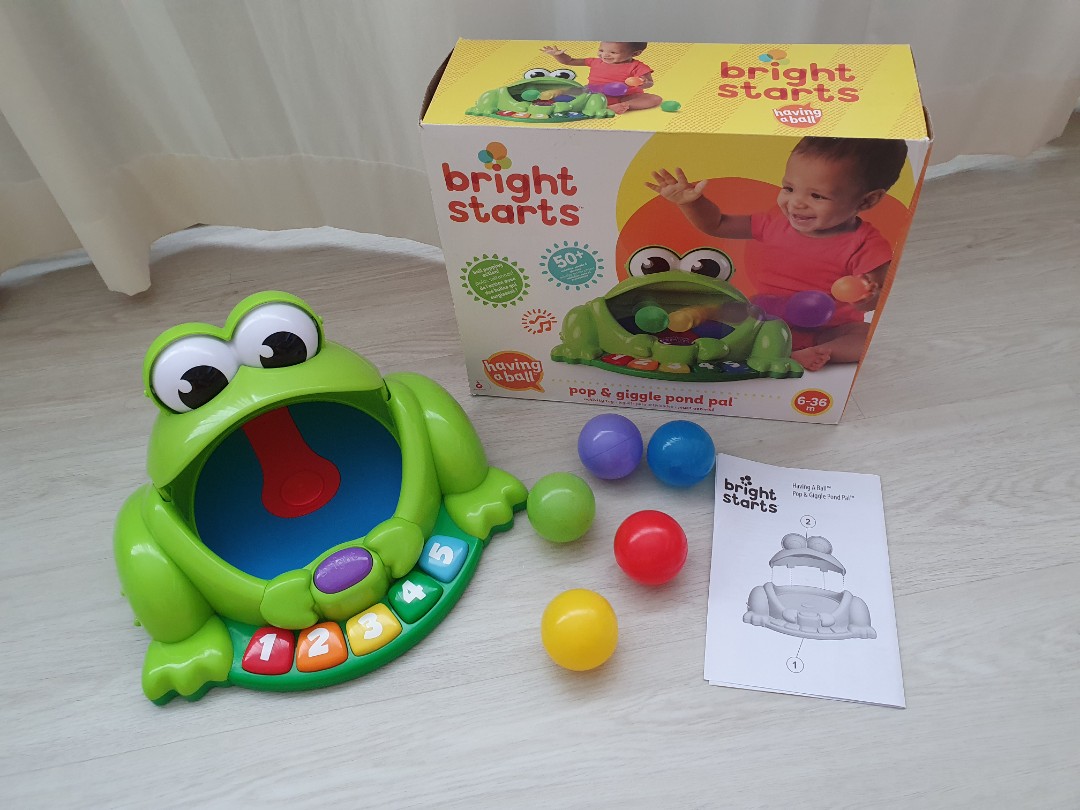 Bright Starts Pop and Giggle ball popping musical frog toy set