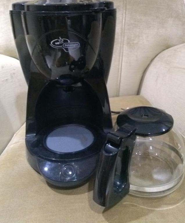 De Longhi Drip Coffee (Category: Coffee Machines & Makers) located in Quezon City. Submitted by magenta888 (Listing ID 1078168928, Image 3). Description: The coffee maker is like new. I got this from Rustans at around P4k. Specs below: Weight (Kg): 1,7 Rated voltage/Frequency (V~Hz): 220-240 V / 50-60 Hz Input power (W): 900 Choose your favourite colour: Black Autoshut OFF: ✓ Carafe: Glass Coffee filter: Paper Controls: Buttons Cups: 10 External 