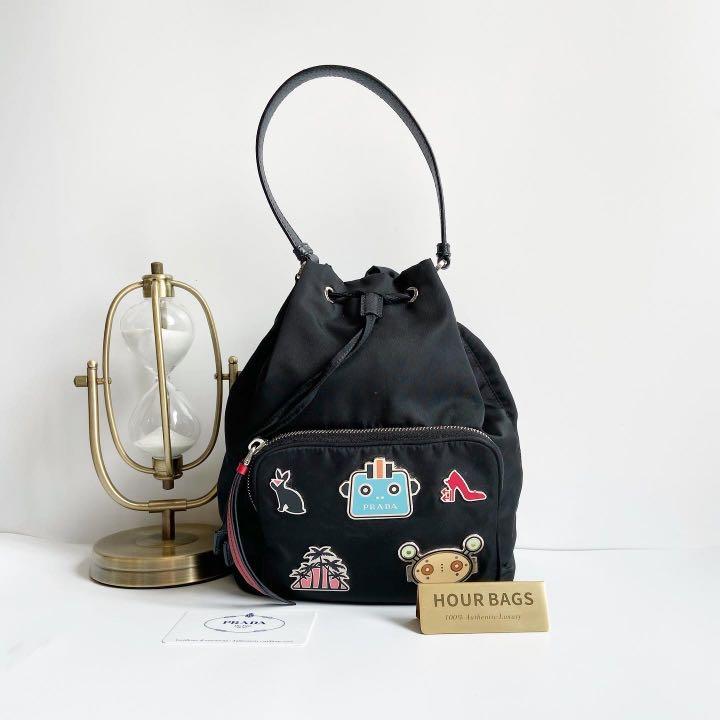 Authentic Prada black nylon bucket bag with charm Luxury