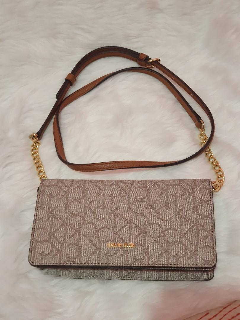 Calvin klein sling wallet clearance