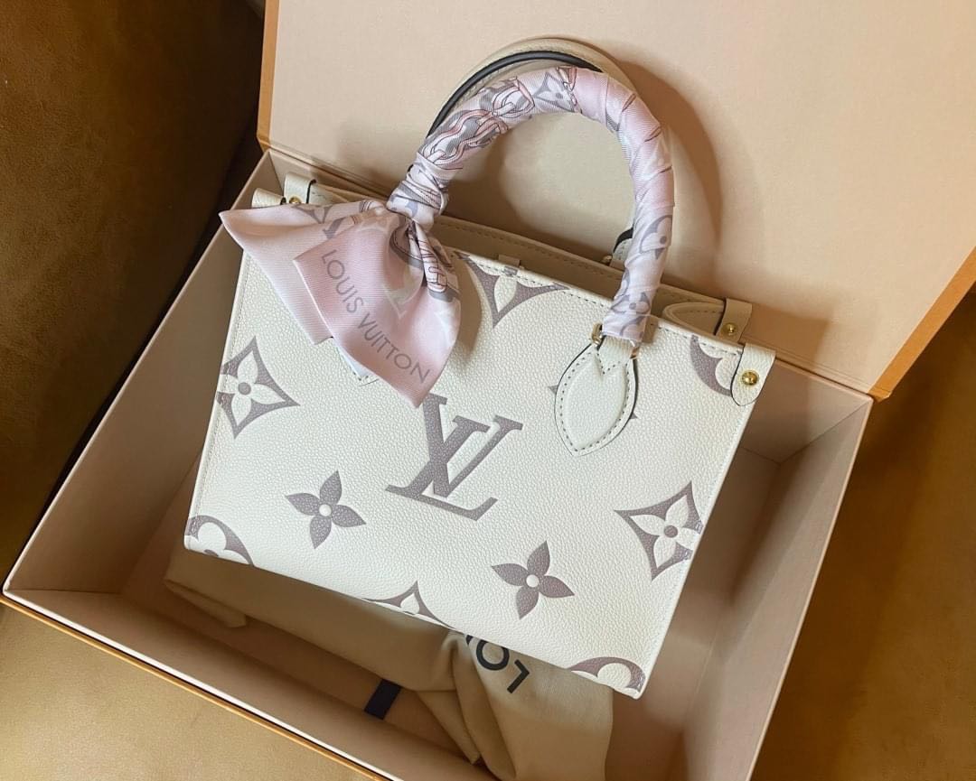 Louis Vuitton Onthego PM crème / white, Luxury, Bags & Wallets on Carousell