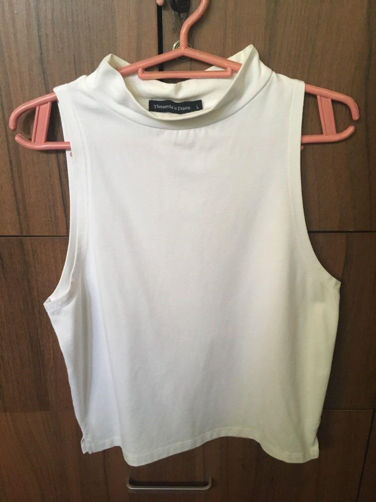 Sleeveless White Turtleneck Top (Category: Sleeveless) located in Taytay. Submitted by decluttering_ce (Listing ID 1078571216, Image 1). Description: • Tag says L but it fits small to medium frame • MOP: bank transfer (bpi for qr code) maya & gcash • RFS: decluttering & need funds.