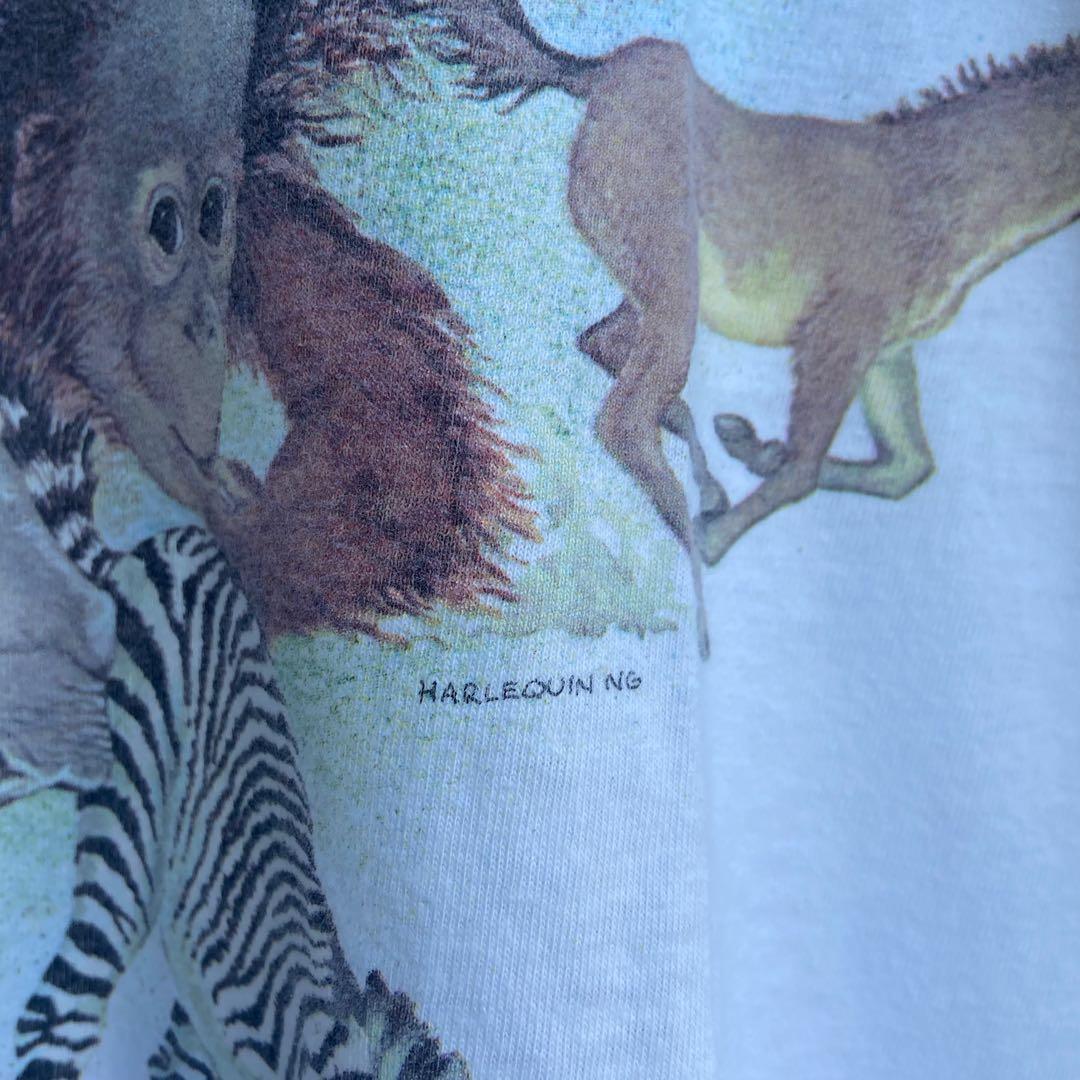 Vintage Animal Tee Harlequin (Category: Tshirts & Polo Shirts ) located in Manila. Submitted by marktongson (Listing ID 1078643979, Image 3). Description: Vintage Harlequin Baby Animals 🐵 - From the personals. Shows the faces of your favorite animals, but in baby form 🍼 haven’t worn it much and fits a bit small on me. - Condition 10/10 Issue: None Tag: Harlequin Tag - Size: Size Medium to Large - 21” Pit to Pit x 27.5” Top to Bottom - Price: PH