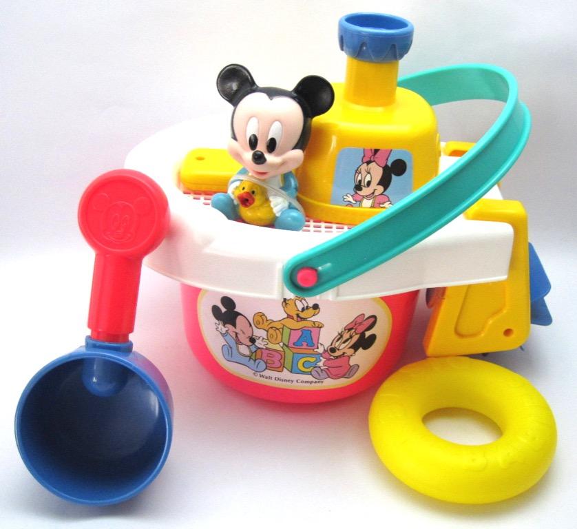 Mickey Disney Pail Bath Toy (Category: Infant Playtime) located in Manila. Submitted by coolandchic (Listing ID 278643152, Image 3). Description: 🔅 Can be played in water 🔅 Played while taking a bath 🔅 Includes: bucket, wheel, ladle, Mickey, buoy 🔅 Mickey squirts and wheel turns when water is placed 🔅 Pail cover can be removed and can put things inside .