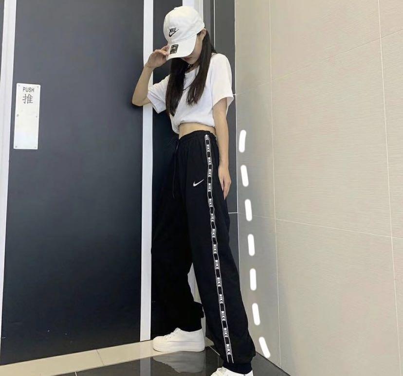 100 Nike logo trousers track pants 100