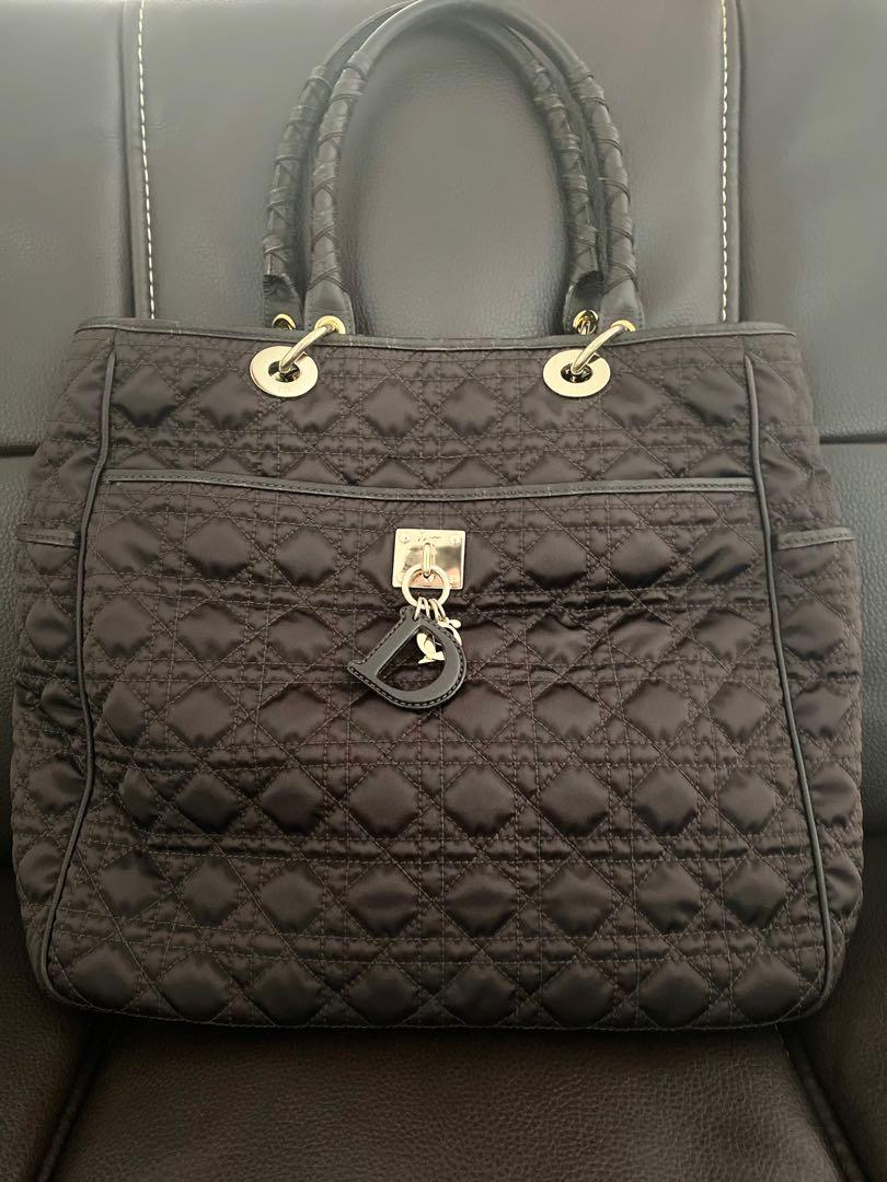 Authentic Christian Dior Tote bag (Category: Luxury Bags & Wallets) located in Paranaque City. Submitted by french21closet (Listing ID 1073383397, Image 1). Description: Authentic Christian Dior Tote bag Color: Dark Brown/Nylon with signature Dior Chain In very good condition “This is preloved, please expect signs of usage and manage your expectations” For serious takers only PM me if interested: SMS 09174506853.