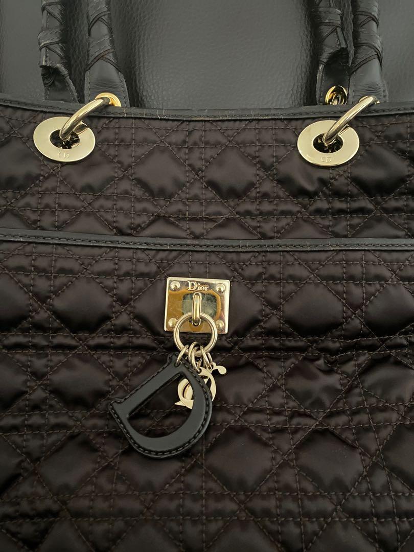 Authentic Christian Dior Tote bag (Category: Luxury Bags & Wallets) located in Paranaque City. Submitted by french21closet (Listing ID 1073383397, Image 2). Description: Authentic Christian Dior Tote bag Color: Dark Brown/Nylon with signature Dior Chain In very good condition “This is preloved, please expect signs of usage and manage your expectations” For serious takers only PM me if interested: SMS 09174506853.