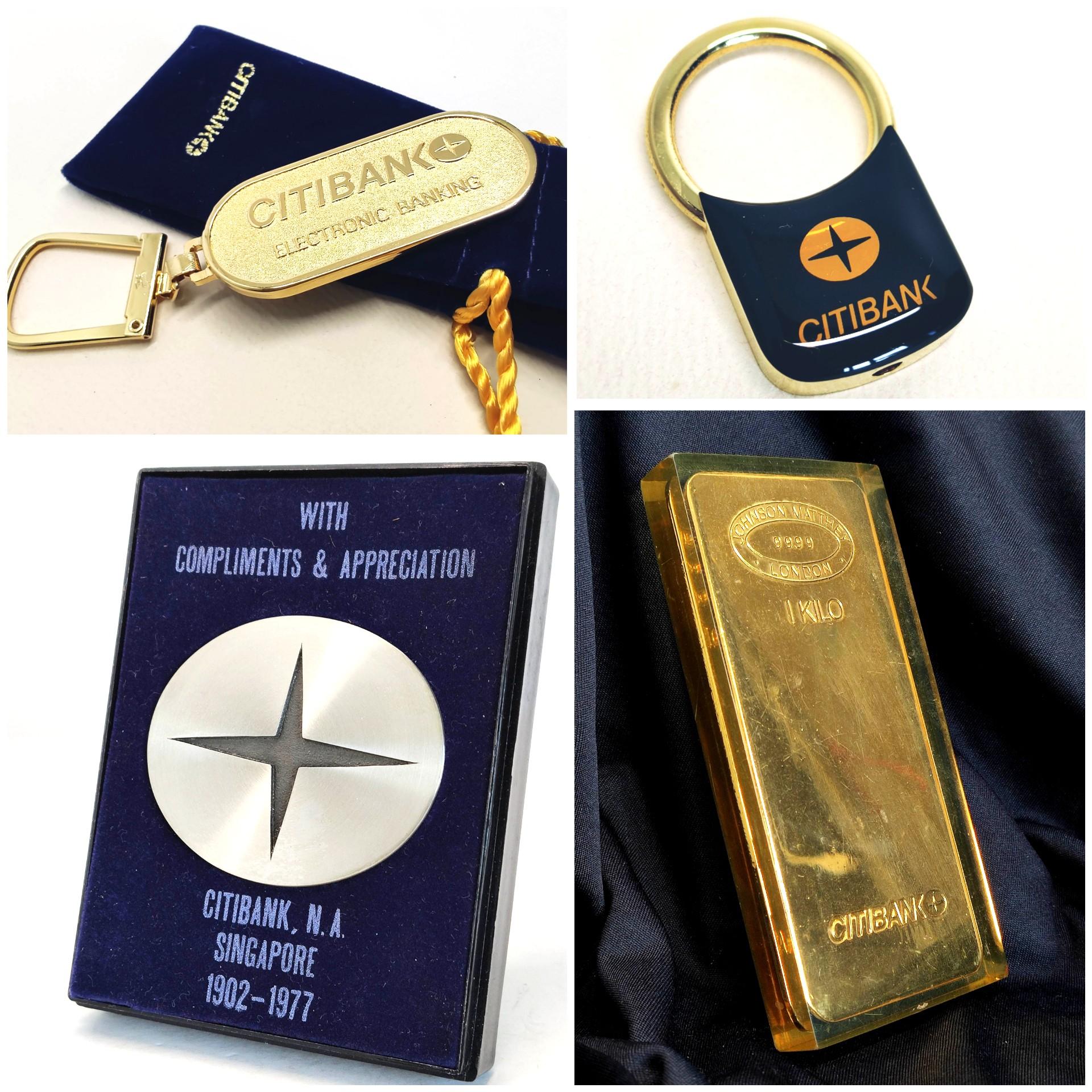 Citibank memorabilia commemorating 75 years gold paperweight bar