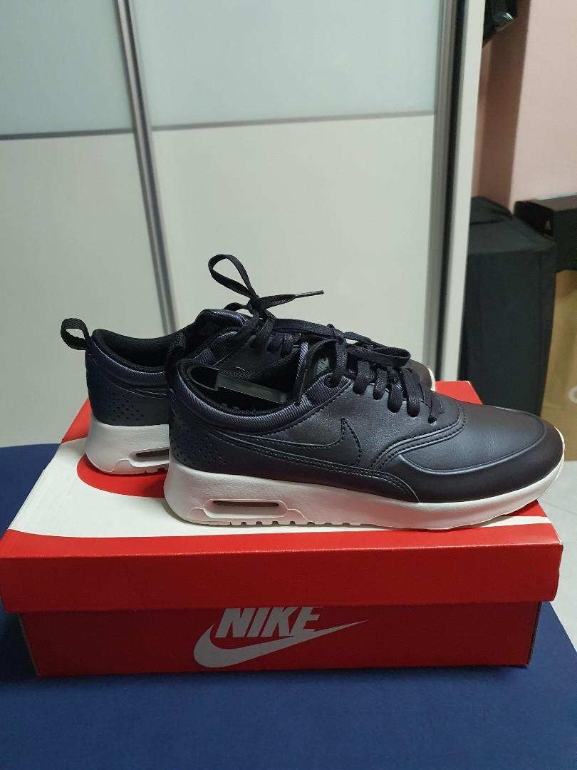 nike thea sneakers