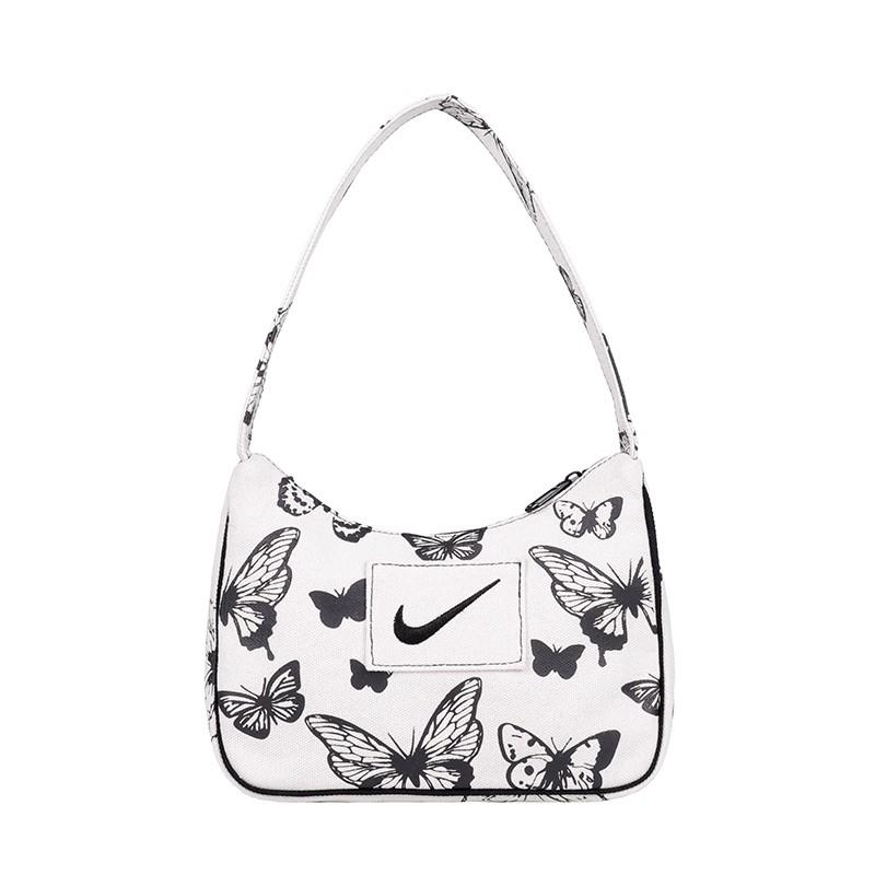 NIKE BUTTERFLY IN WHITE