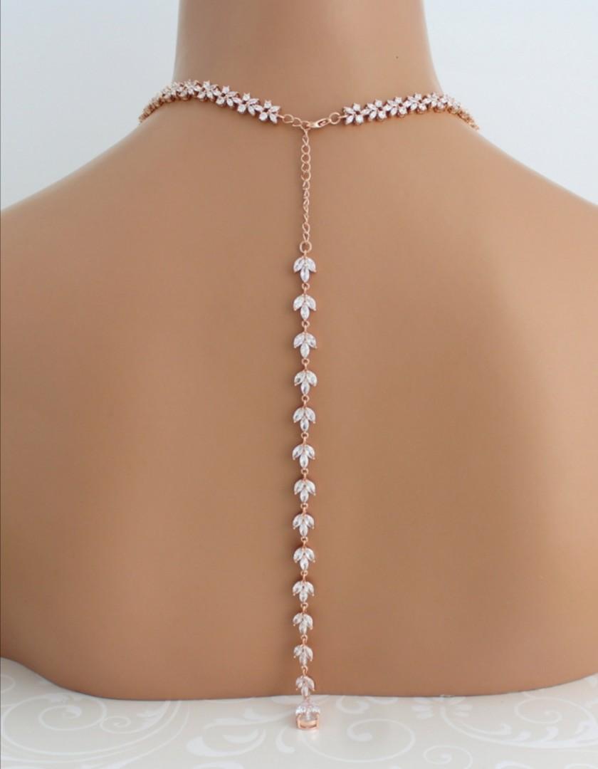 Gold shop backdrop necklace