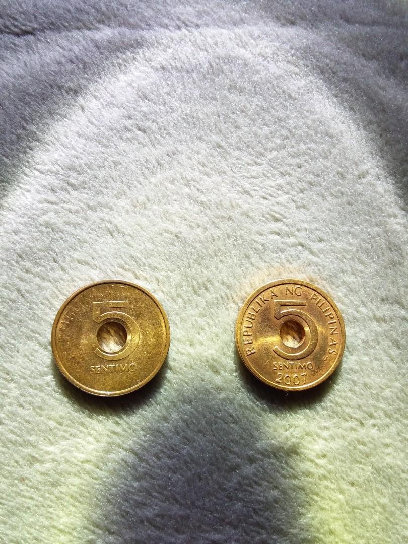 RARE MINT ERROR COIN 2016 5-Sentimo (Category: Currency) located in Quezon City. Submitted by doctornis (Listing ID 1074004995, Image 3). Description: Selling a very rare mint error 2016 5-Sentimo BSP coin series. At first glance, you will notice there is no text on the coin, just the "5" and the word "SENTIMO". But If you look closely, the text is printed in a uniquely opaque fashion which shines visibly when light is directed on different angle