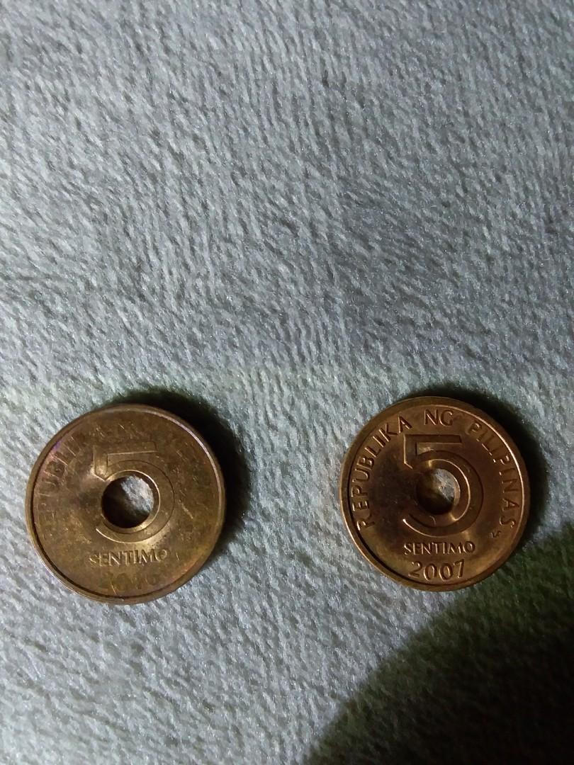 RARE MINT ERROR COIN 2016 5-Sentimo (Category: Currency) located in Quezon City. Submitted by doctornis (Listing ID 1074004995, Image 2). Description: Selling a very rare mint error 2016 5-Sentimo BSP coin series. At first glance, you will notice there is no text on the coin, just the "5" and the word "SENTIMO". But If you look closely, the text is printed in a uniquely opaque fashion which shines visibly when light is directed on different angle