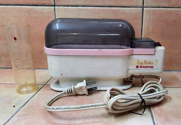 Sanyo Electric Egg Boiler (Category: Cookware & Accessories) located in Quezon City. Submitted by charliebrown_olx (Listing ID 1073799137, Image 1). Description: Brand: Sanyo Volt: 220 Condition: Good, Working, WYSIWYG, No Warranty TERMS & CONDITIONS: 1. C.O.D. Can meet buyers at - Del Monte Ave, Q.C. 2. Shipping c/o buyer. 3. Prices are Final. 4. Respect the Ad. TFL!.