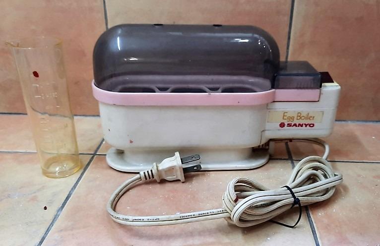 Sanyo Electric Egg Boiler (Category: Cookware & Accessories) located in Quezon City. Submitted by charliebrown_olx (Listing ID 1073799137, Image 2). Description: Brand: Sanyo Volt: 220 Condition: Good, Working, WYSIWYG, No Warranty TERMS & CONDITIONS: 1. C.O.D. Can meet buyers at - Del Monte Ave, Q.C. 2. Shipping c/o buyer. 3. Prices are Final. 4. Respect the Ad. TFL!.
