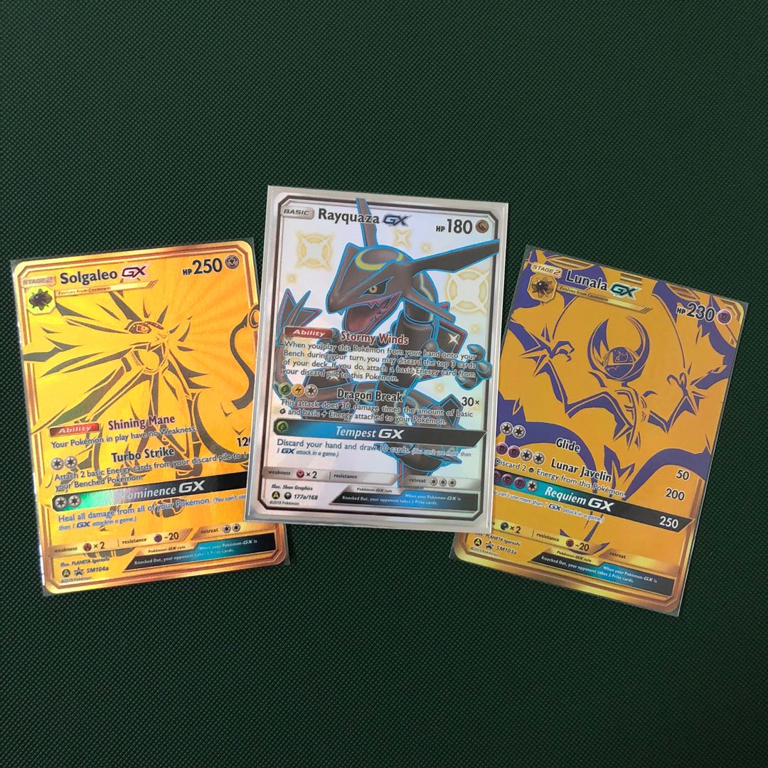 Box Pokémon Destinos Ocultos Rayquaza-GX Shiny Solgaleo-Gx Dourado