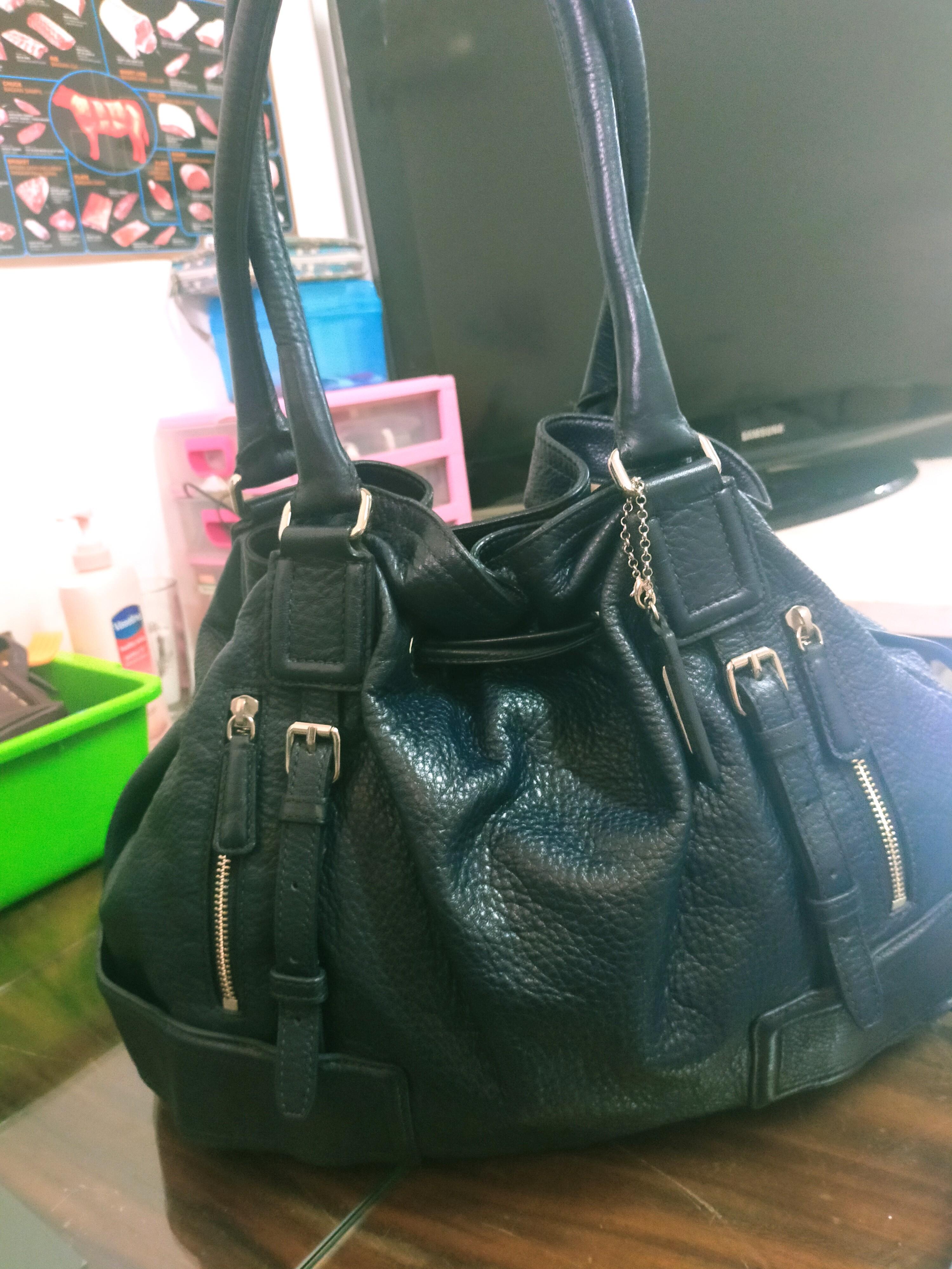 Cole haan bag price store