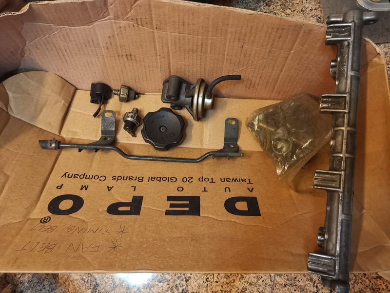 Lancer cs3 engine oil cap ,fuel rail,gasket,egr , socket, injector, air pipe, engine screw and