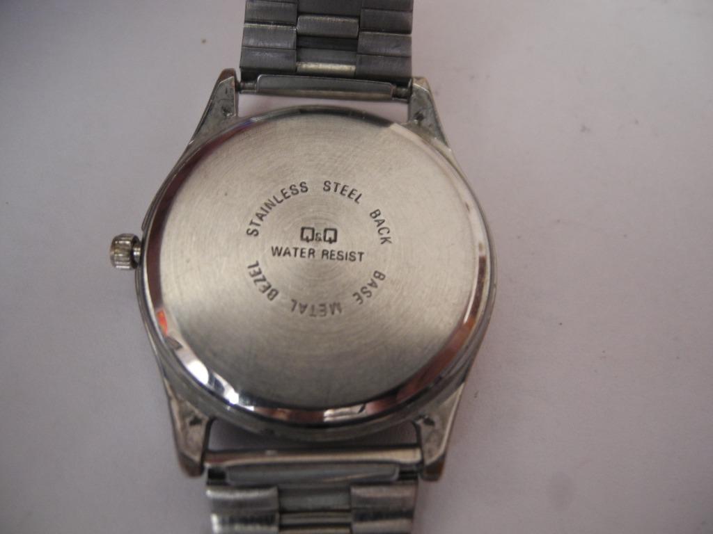 Q&q stainless steel back discount base metal bezel water resist
