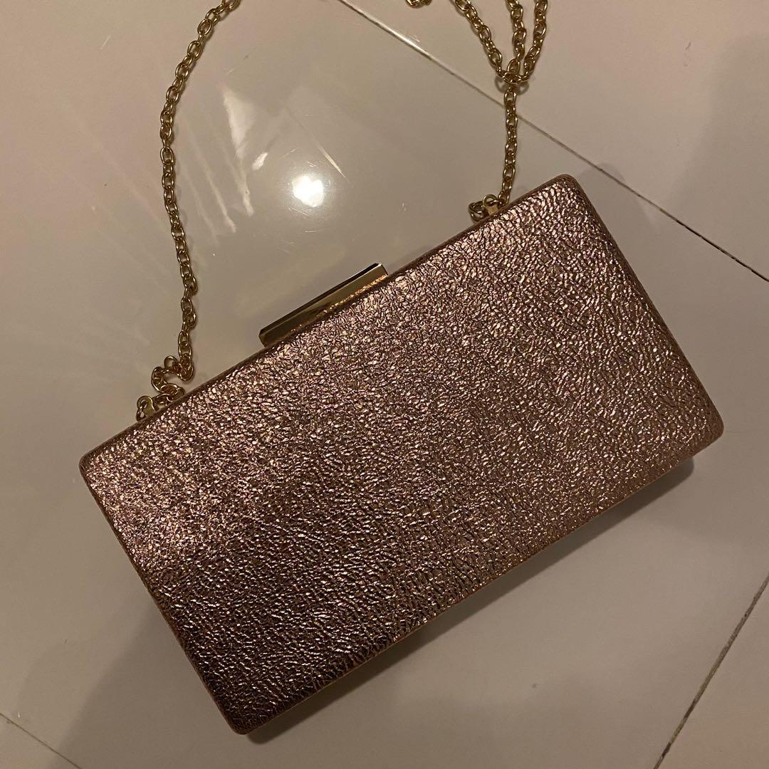Rose gold clutch bag with chain clearance