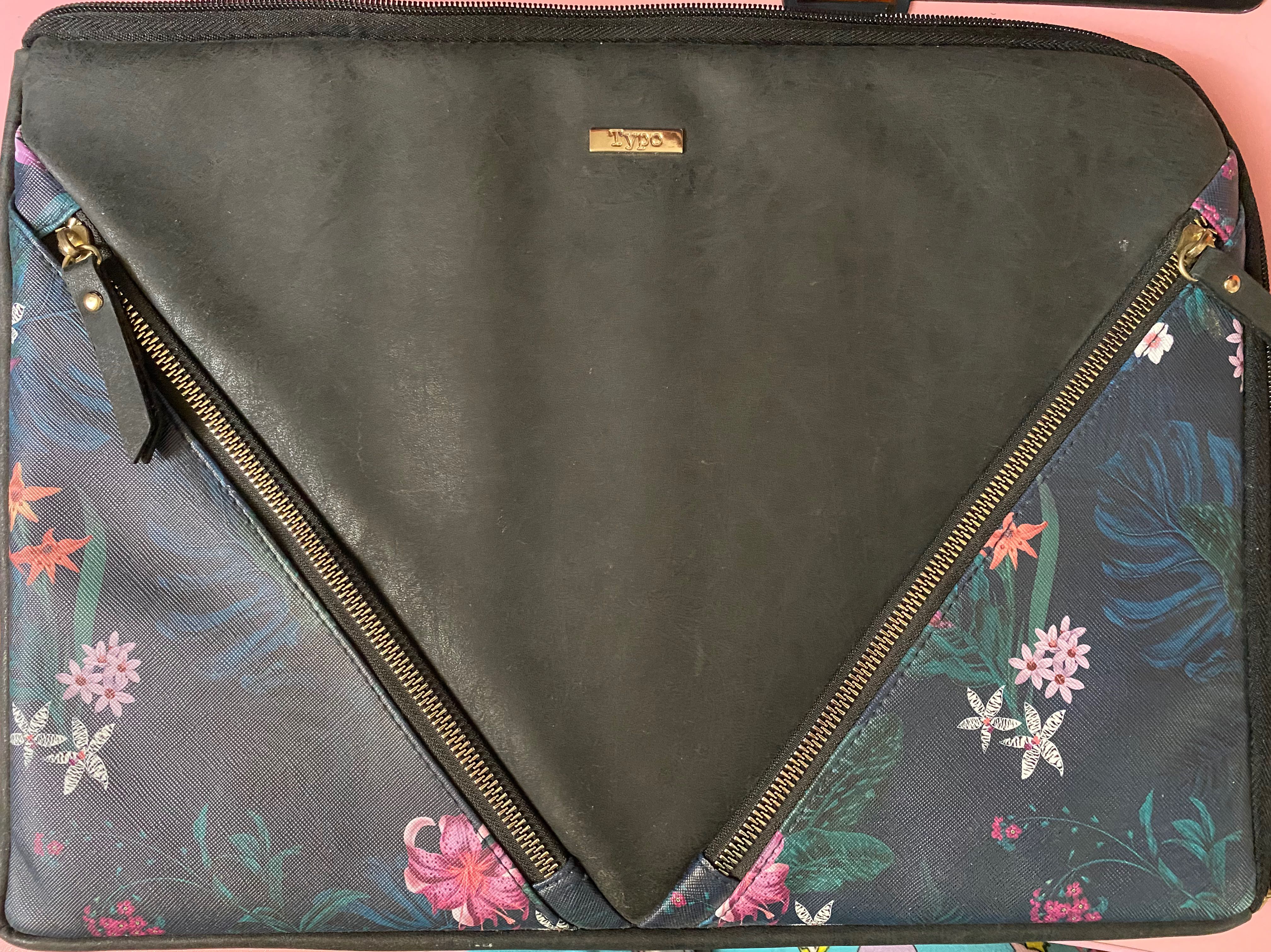 typo laptop sleeve
