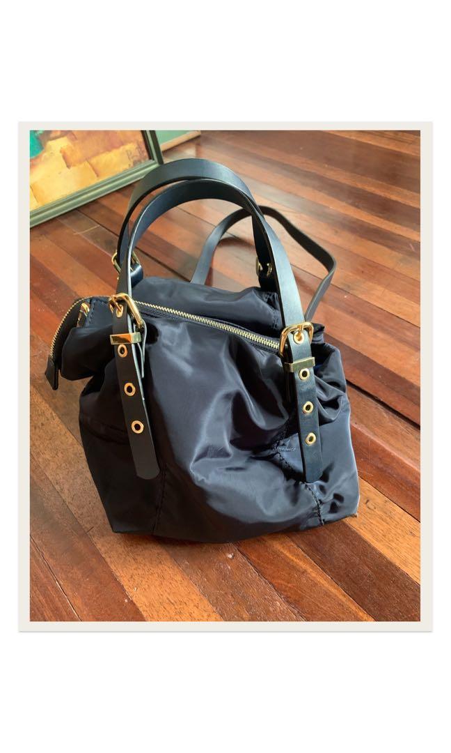 Zara Handbag (Category: Tote Bags) located in Makati City. Submitted by pclrecto (Listing ID 1074062539, Image 1). Description: - Used but not abused - SUPER CUTE! - Can turn into a sling bag. The straps can be removed by a buckle. .