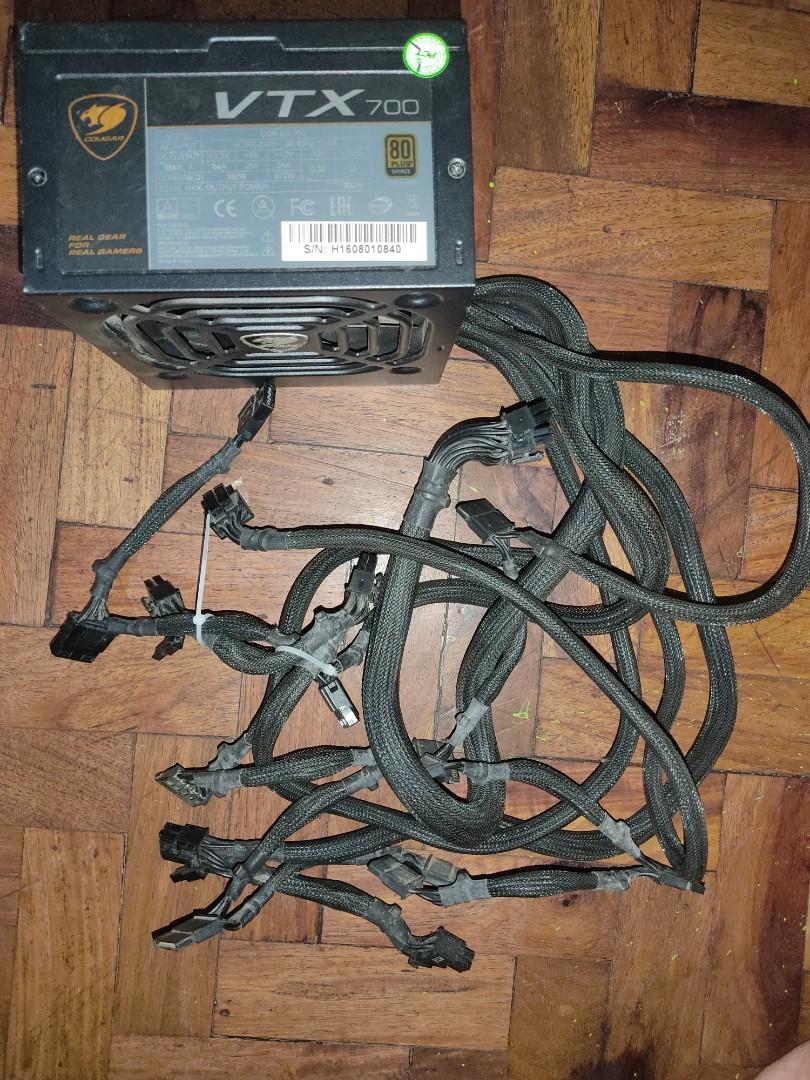 Cougar VTX 700 (700W 80+ Bronze) (Category: Computer Parts) located in Valenzuela. Submitted by firstvalb (Listing ID 1078783568, Image 1). Description: Condition - 7/10 Issue: Accidentally break 1 SATA Connector there are remaining SATA connectors so you don't need to worry about it. Still in good condition and working fine! RFS: Upgrade to 850W PSU since planning also to upgrade my GPU.