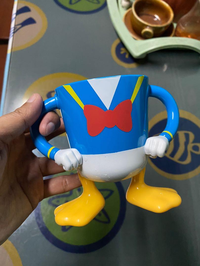 https://media.karousell.com/media/photos/products/2021/4/1/donald_duck_mug_1617277989_0618e2b4_progressive.jpg