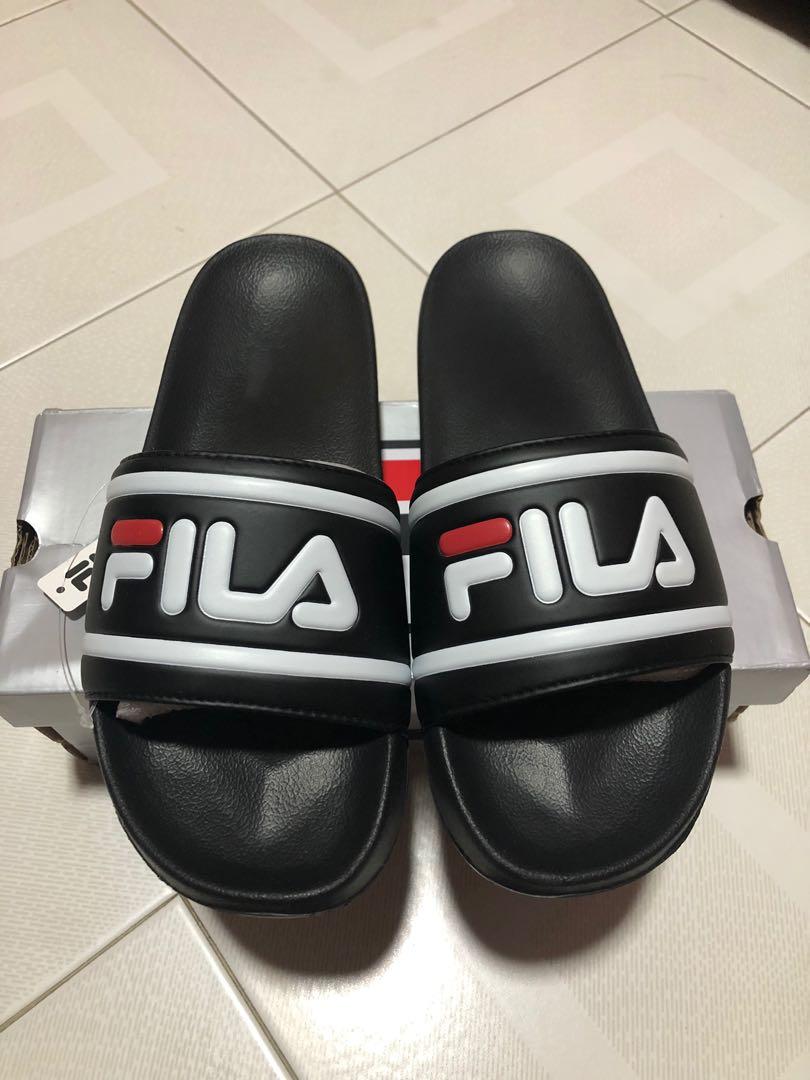 Fila Sliders in black, Luxury, Sneakers & Footwear on Carousell