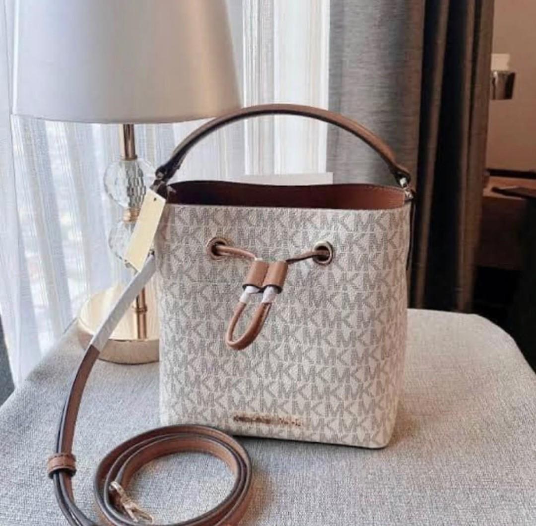 Michael Kors Suri Small Bucket Crossbody Bag, Women's Fashion, Bags &  Wallets, Cross-body Bags on Carousell