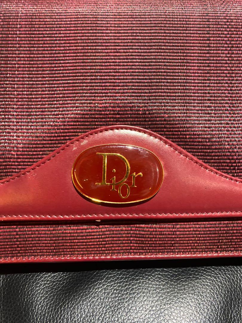 Authentic Christian Dior clutch (Category: Luxury Bags & Wallets) located in Paranaque City. Submitted by french21closet (Listing ID 1080737372, Image 2). Description: Authentic Vintage Christian Dior Clutch Color: Dark Red applicable for sling flaws as seen in the last photos “Please expect signs of usage and manage your expectations” For serious takers only PM me if interested: SMS 09174506853.
