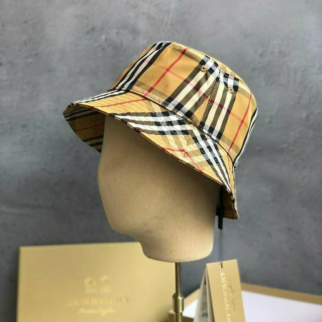 Burberry Bucket Hat Icon Stripes, Women's Fashion, Watches & Accessories,  Hats & Beanies on Carousell