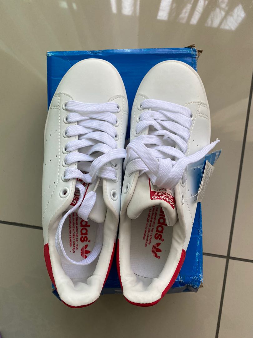 Box of adidas stan sale smith
