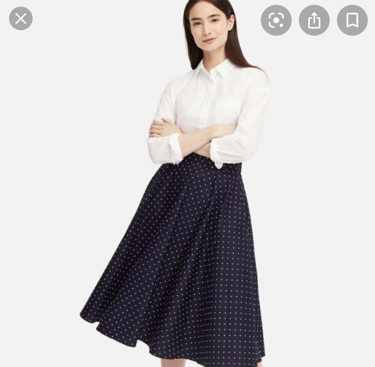 Uniqlo Polka dot dark blue circular midi skirt looking to trade Women s Fashion Bottoms Skirts on Carousell