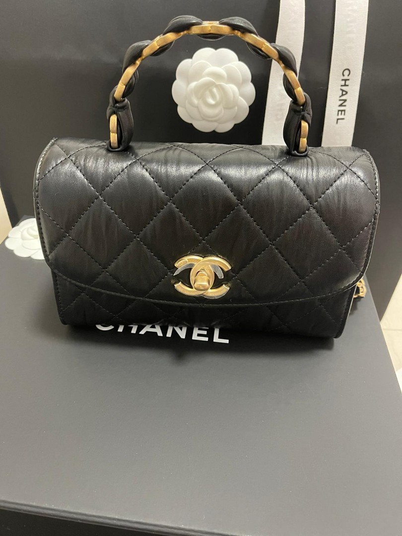Chanel mini flap bag with top handle, Luxury, Bags & Wallets on