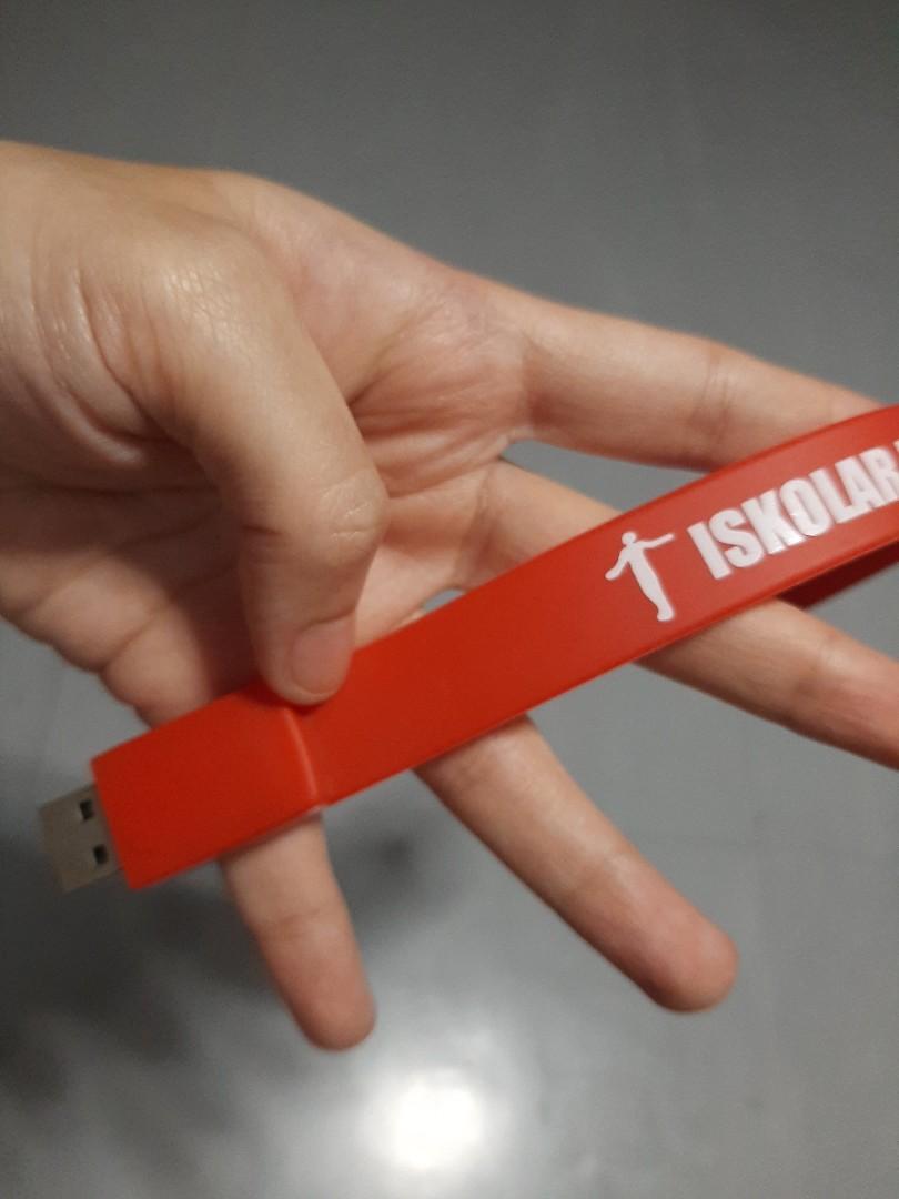 Never been used Iskolar ng Bayan USB/bracelet (Category: Memory & SD Cards) located in Pasig City. Submitted by sgangeles (Listing ID 1080873982, Image 2). Description: Can be a collector's item for Iskos/Iskas there too. Not sure with the memory storage though.
