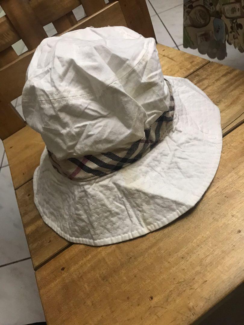 Burberry off white bucket hat, Women's Fashion, Watches & Accessories, Hats  & Beanies on Carousell