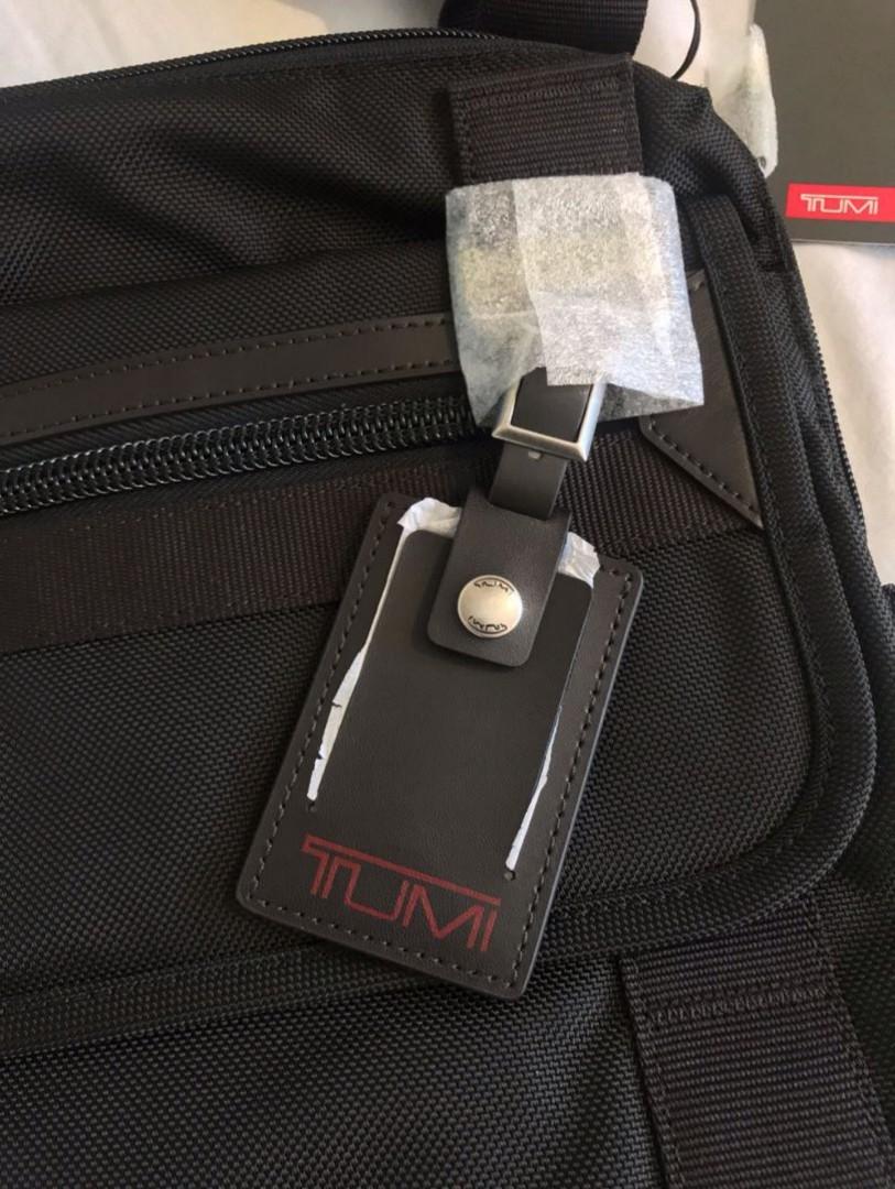 Tumi eastern shop flap crossbody bag