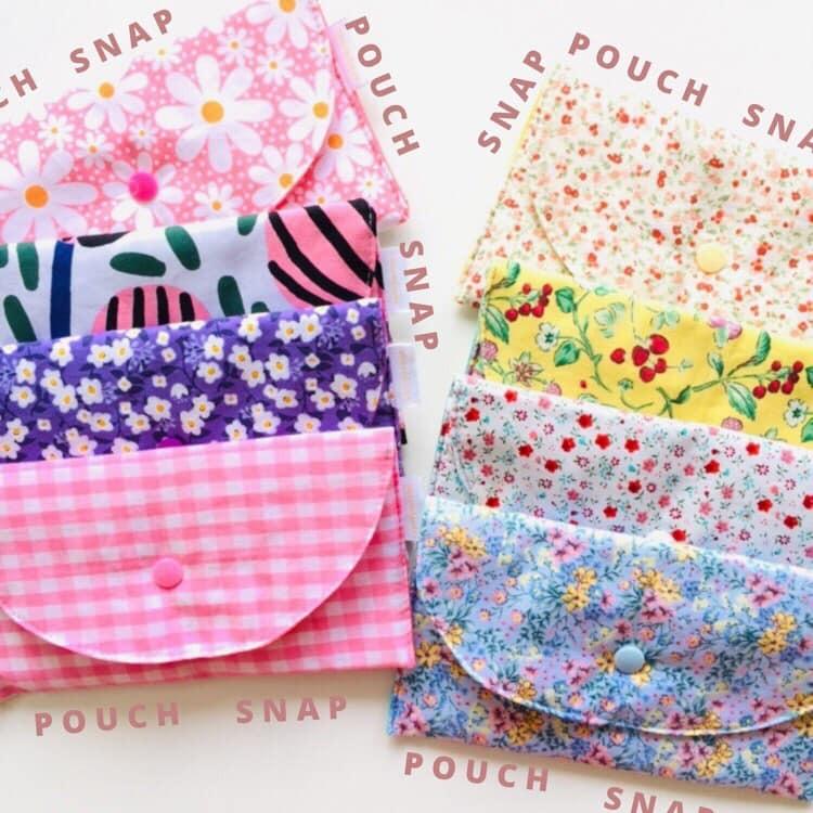 Dainty Snap Cushioned Pouches (Category: Purses & Pouches) located in Rizal. Submitted by decluttercornerph (Listing ID 1081236946, Image 1). Description: Daily cushioned snap pouches now available! Shop these pretty pouches for only Php 80.00 each. Don’t panic, it’s washable! ❤️ *Product details Measurement: 20 x 12 cm Fabric: Cotton woven & poplin with snap button closure & cushion.