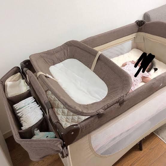 Crib with diaper changer top