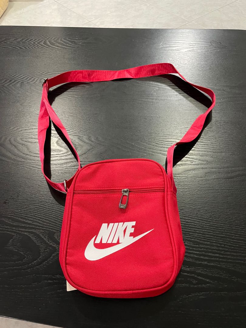 red nike satchel