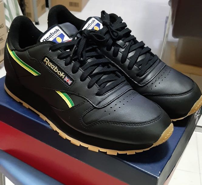 Reebok black and online green sport shoes
