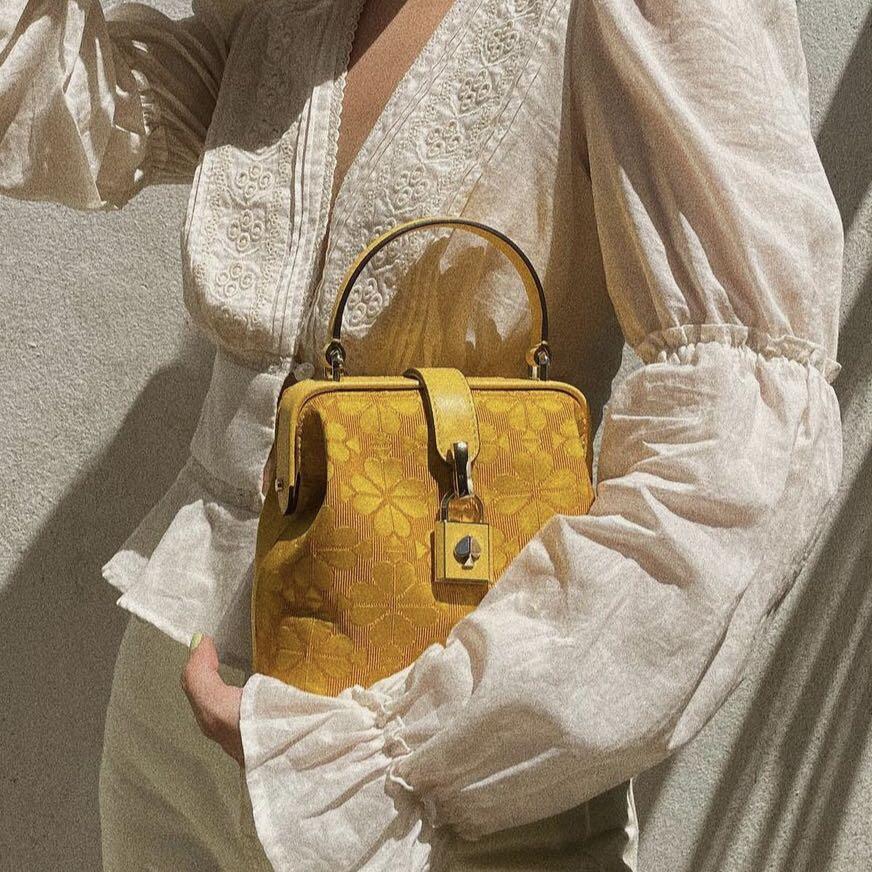 Kate spade remedy top handle bag online