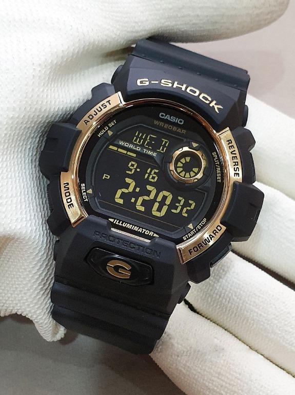 G shock illuminator hot sale black and gold