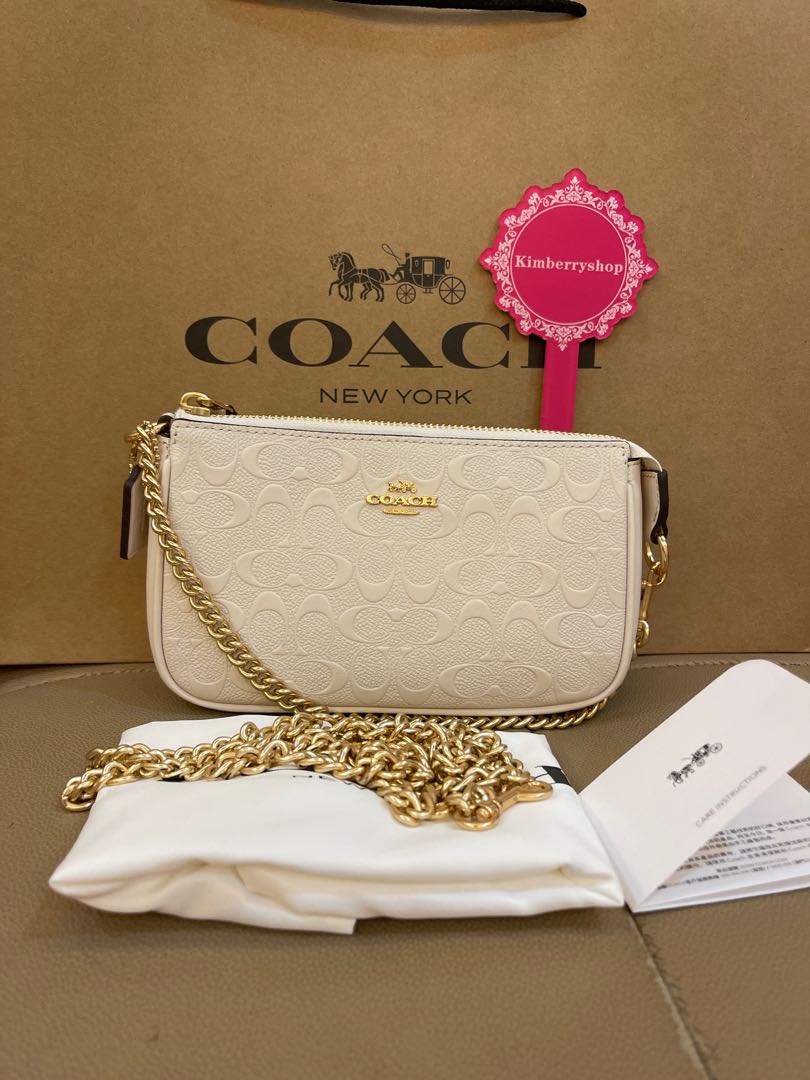 Ready stock authentic coach 67567 sling bag white monogram clutch wristlet Women s Fashion Bags Wallets Purses Pouches on Carousell
