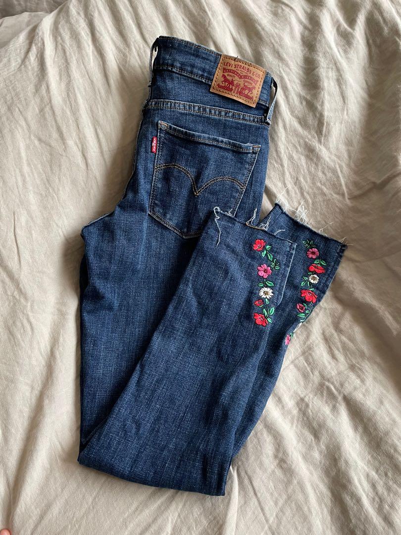 Embroidered levi jeans on sale