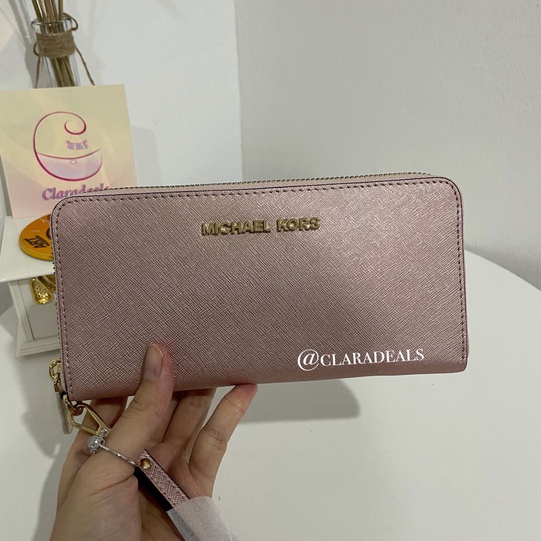mk pink wristlet